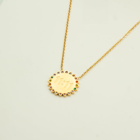 Embrace the power of manifestation with the Navaratna 11:11 Necklace. This unique necklace features the powerful Navaratna stones that represent the nine planets, bringing harmony, prosperity, and protection. Make a statement and attract good fortune with this quirky and playful necklace.&nbsp;  Material: Stainless Steel Plating: 18K Gold-Plated Waterproof Hypoallergenic Anti-tarnish