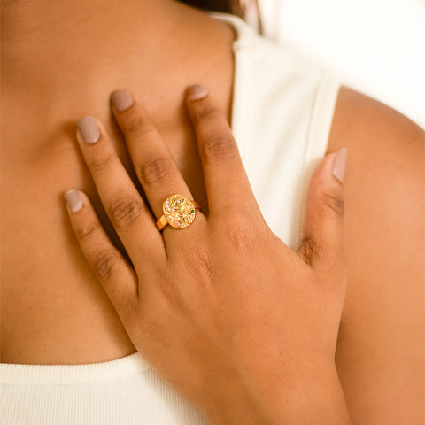Wrap your finger in the stellar charm of this Starry Orbit Ring. With a unique design featuring a ring of stars, this ring is sure to elevate any outfit and make you shine like the night sky. Perfect for star-gazers and those who want to add a touch of whimsy to their style.  Material: Stainless Steel Plating: 18K Gold-Plated Waterproof Hypoallergenic Anti-tarnish