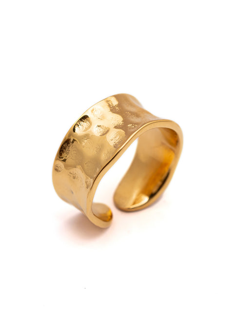 This modern and contemporary textured gold ring is the epitome of elegance. Made from high-quality 18k gold plating, this ring is not only durable but also boasts a beautiful and unique texture that sets it apart from the rest. Whether you're dressing up for a night out or simply looking to add a touch of sophistication to your everyday wear, this ring is sure to make a statement.  Material: Stainless Steel Plating: 18K Gold-Plated Waterproof Hypoallergenic Anti-tarnish